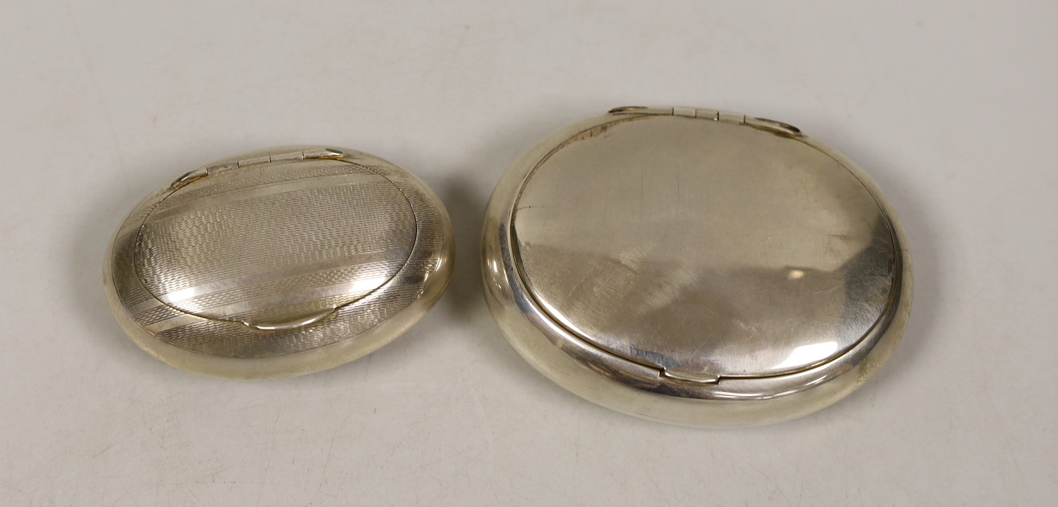 Two early 20th century silver tobacco boxes, including Birmingham, 1906, largest 89mm.